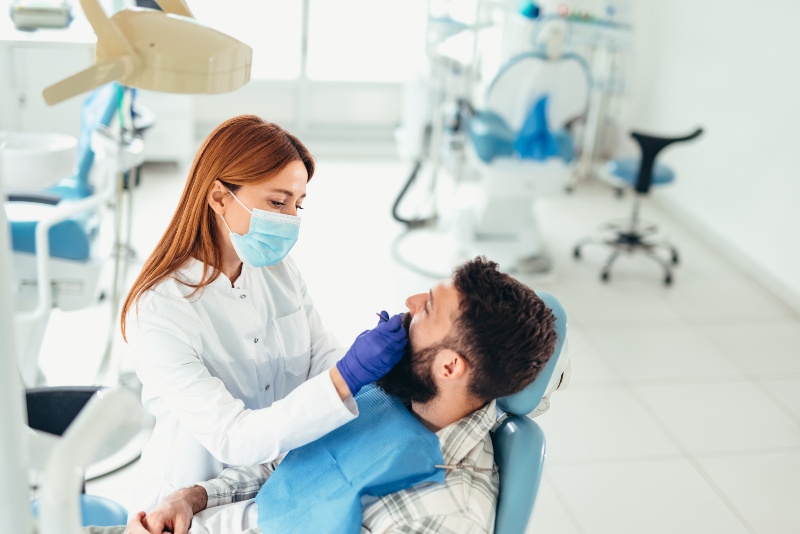 Patient receiving dental crown consultation at a dental office in San Jose, CA